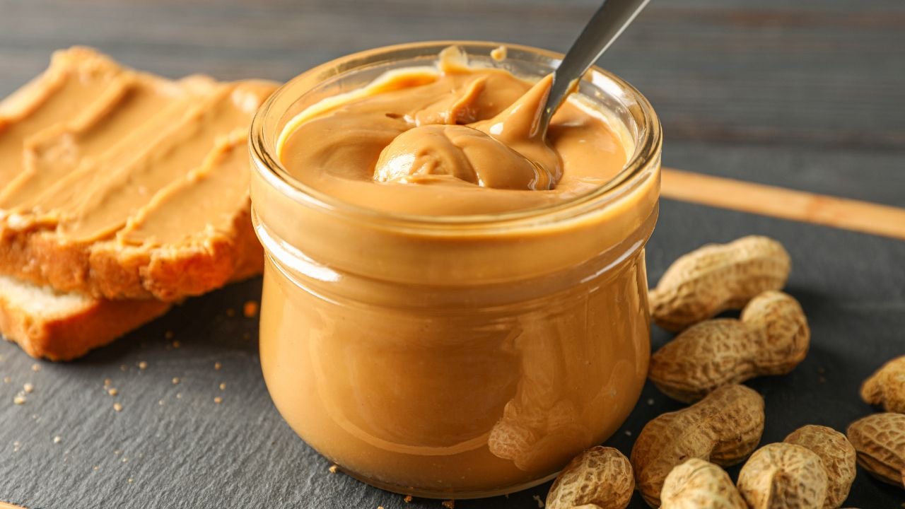 fresh peanut butter in a glass jar